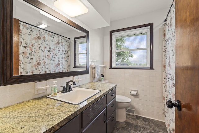 5899 N Springcreek Stringtown Rd, Piqua, OH 45356 - bathroom with tile walls, vanity, and a shower with shower curtain