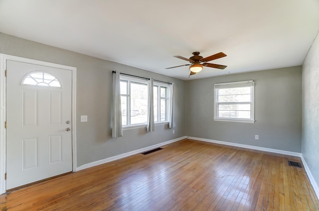 foyer featuring hardwood / wood-style flooring and ceiling fan