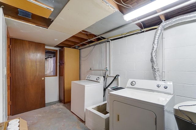 laundry area featuring separate washer and dryer