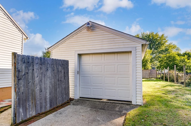 garage with a lawn