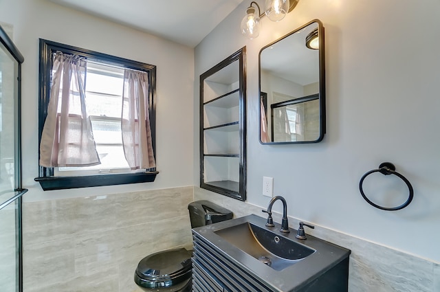 bathroom with vanity and walk in shower