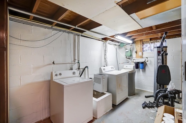 laundry area featuring separate washer and dryer