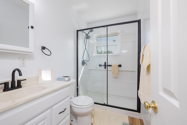 13730 Seminole Path, Lakeview, OH 43331 - bathroom featuring a shower stall, vanity, and tile patterned floors
