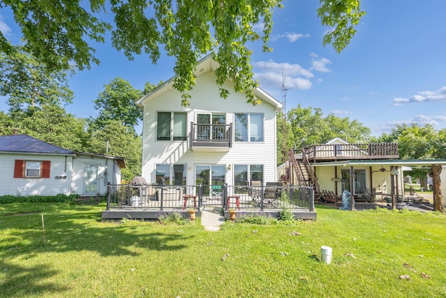 13730 Seminole Path, Lakeview, OH 43331 - rear view of house featuring stairs, a wooden deck, a patio, and a yard