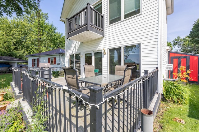 13730 Seminole Path, Lakeview, OH 43331 - patio / terrace with outdoor dining area and a storage shed