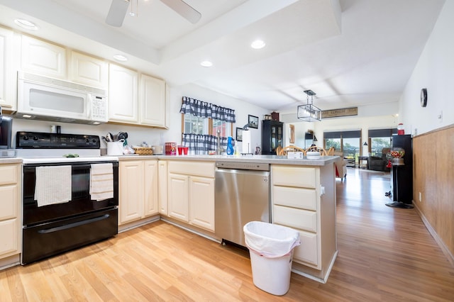 13730 Seminole Path, Lakeview, OH 43331 - kitchen with black range with electric cooktop, stainless steel dishwasher, white microwave, a peninsula, and light wood-style flooring