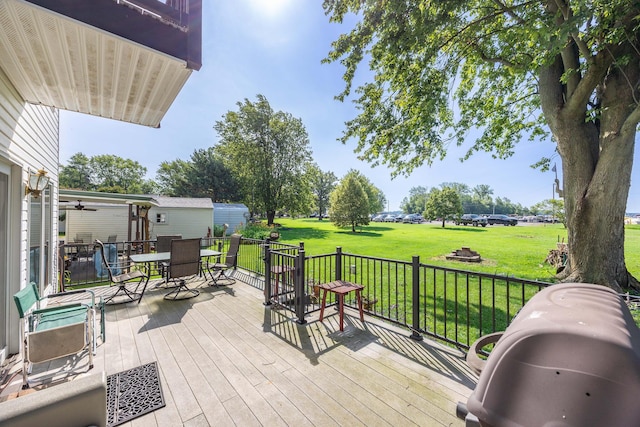 13730 Seminole Path, Lakeview, OH 43331 - wooden terrace with outdoor dining area and a yard
