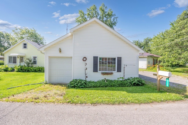 13730 Seminole Path, Lakeview, OH 43331 - view of front facade featuring a garage and a front yard