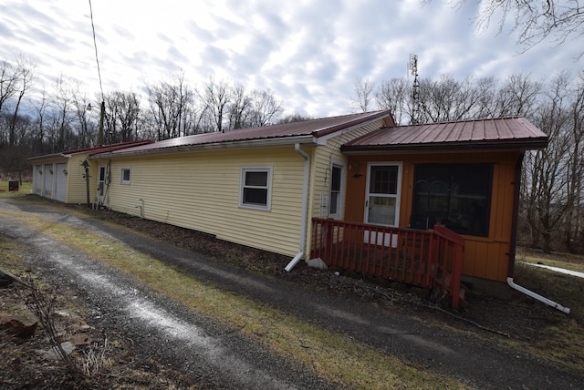 view of property exterior with a garage