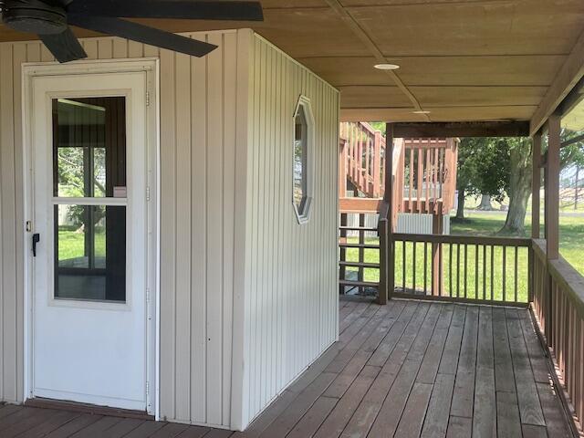 9770 Agerter Rd, Spencerville, OH 45887 - wooden deck with a ceiling fan and a lawn