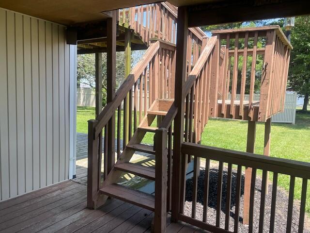 9770 Agerter Rd, Spencerville, OH 45887 - deck with stairway and a lawn