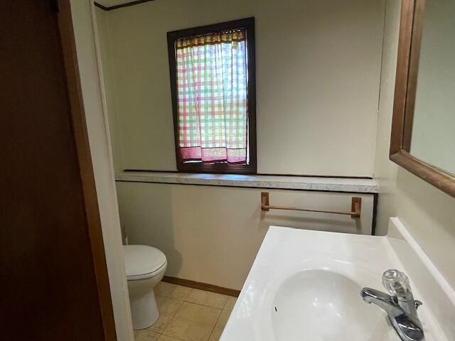 9770 Agerter Rd, Spencerville, OH 45887 - bathroom featuring a sink and toilet