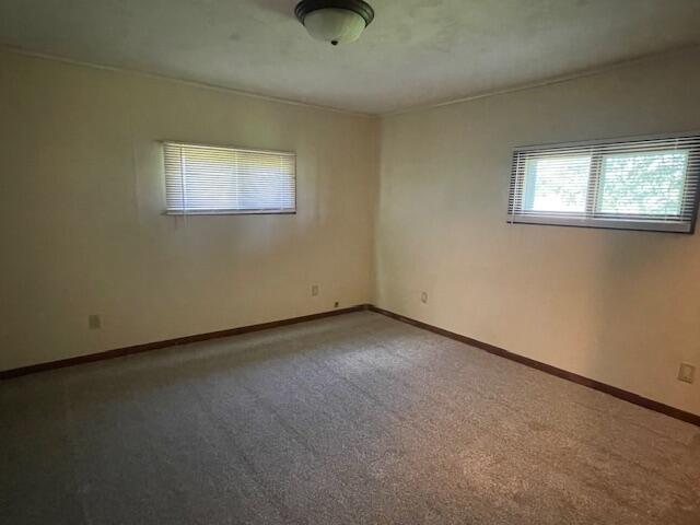 9770 Agerter Rd, Spencerville, OH 45887 - carpeted spare room featuring baseboards
