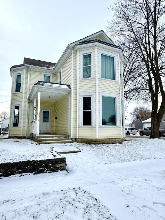 view of snow covered house