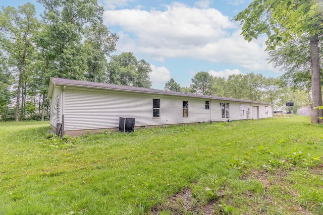 13253 State Route 720, Lakeview, OH 43331 - back of house featuring a yard and crawl space