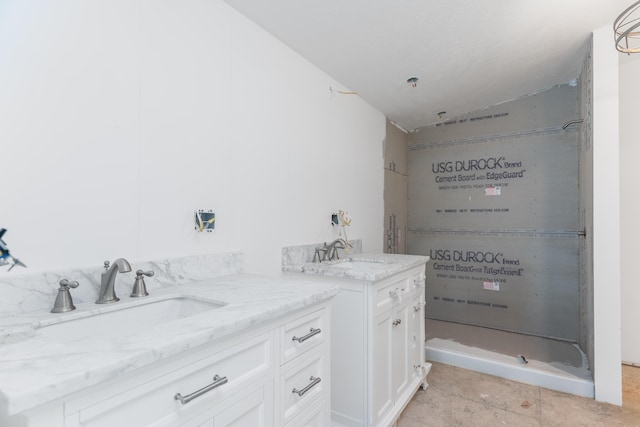 13253 State Route 720, Lakeview, OH 43331 - bathroom with two vanities, lofted ceiling, and tile patterned flooring