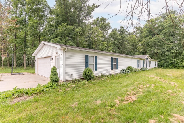 13253 State Route 720, Lakeview, OH 43331 - view of side of home with a detached garage and an outbuilding