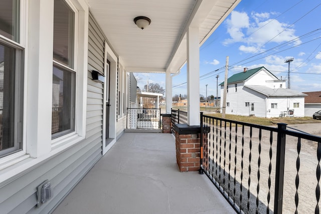 balcony featuring covered porch