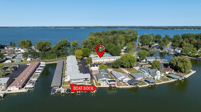 aerial view with a residential view and a water view