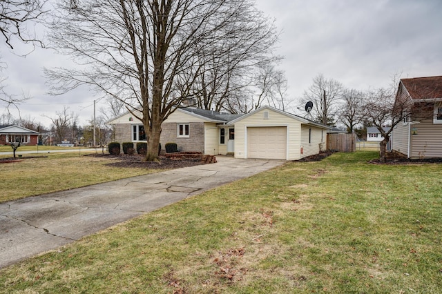 view of front of property with a garage, a front yard, driveway, and fence