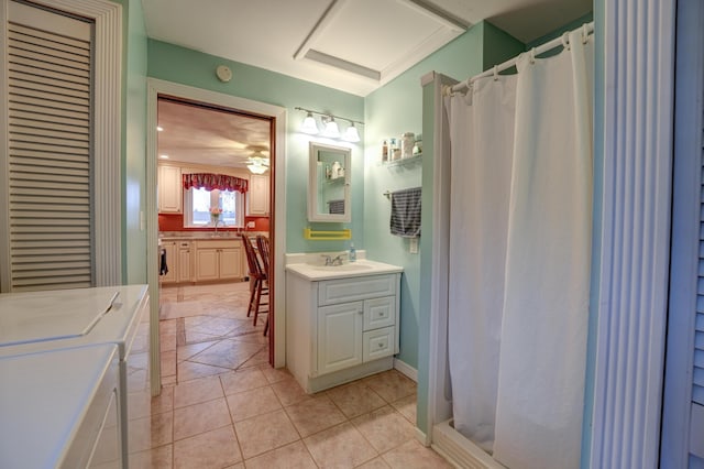 full bath with tile patterned floors, a shower with shower curtain, and vanity