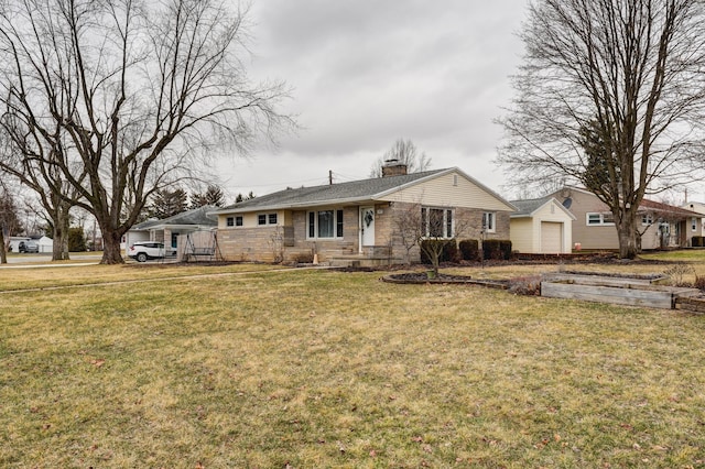 view of front of property featuring a front yard and a chimney