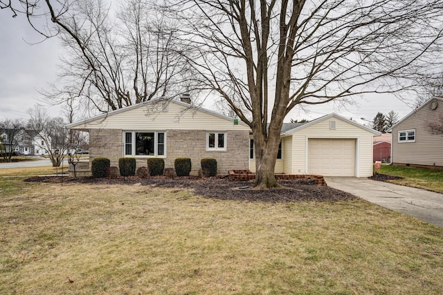 view of front of property featuring concrete driveway, stone siding, and a front yard