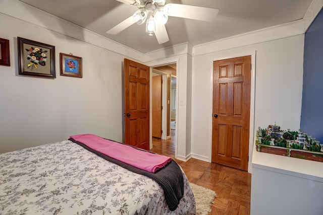 bedroom featuring a ceiling fan and ornamental molding