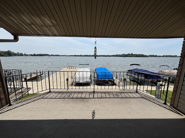 10209 County Road 286 Unit C-16, Huntsville, OH 43324 - view of patio featuring a boat dock, a water view, and boat lift