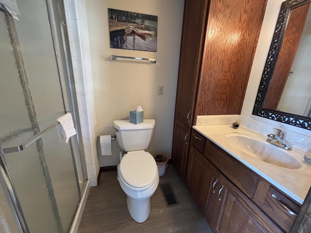 10209 County Road 286 Unit C-16, Huntsville, OH 43324 - bathroom with a stall shower, wood finished floors, and vanity