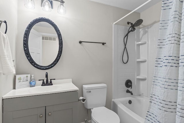 full bathroom with vanity, shower / bath combination with curtain, visible vents, and toilet