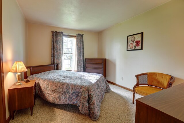 9743 State Route 118, Ansonia, OH 45303 - carpeted bedroom with baseboards