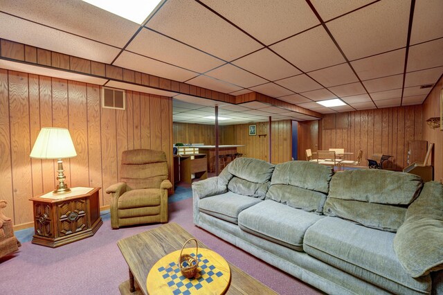9743 State Route 118, Ansonia, OH 45303 - carpeted living area with wood walls and a drop ceiling