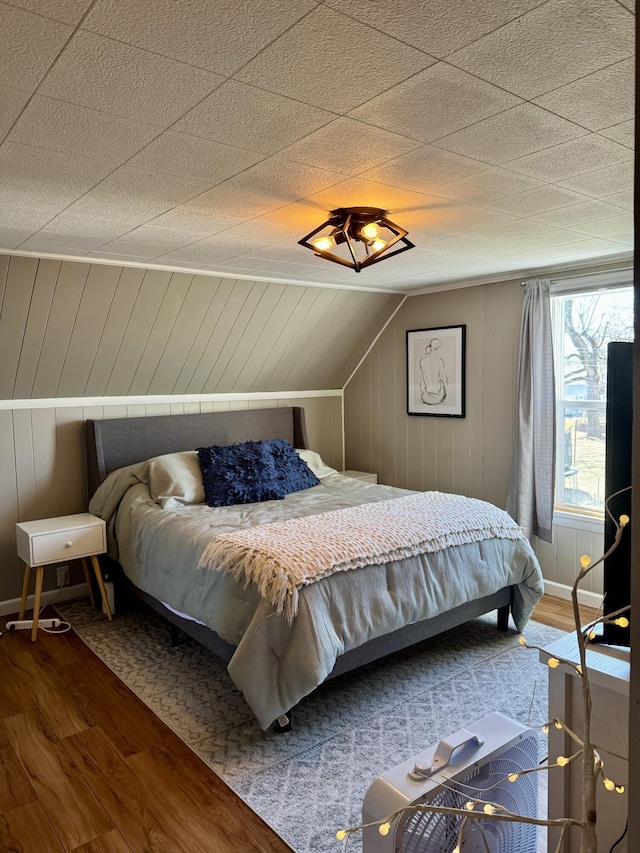 bedroom featuring wood finished floors