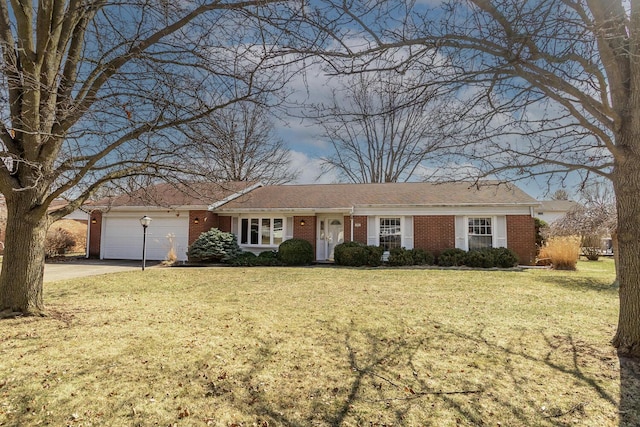 ranch-style home with brick siding, driveway, a front lawn, and a garage