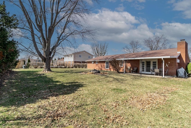 view of yard with a patio area and fence