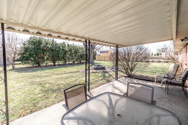 view of patio / terrace featuring outdoor dining space and fence