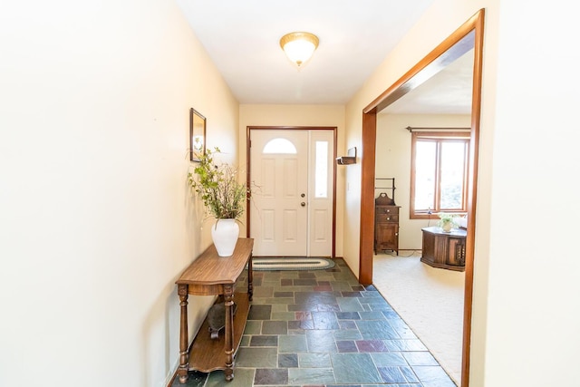 foyer entrance with stone finish floor