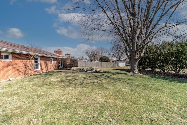 view of yard featuring fence