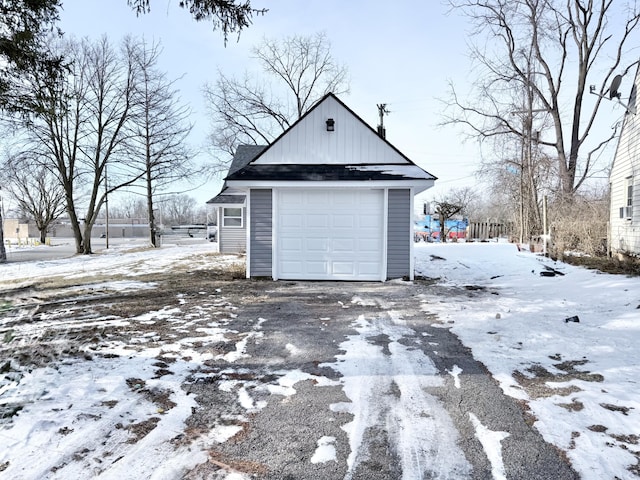 view of snow covered garage