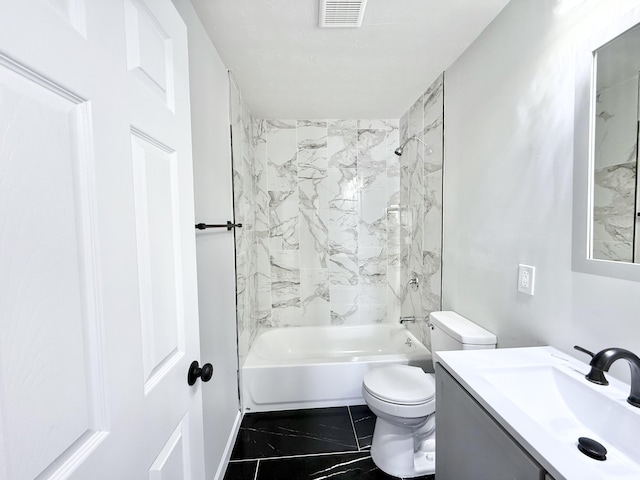 full bathroom with vanity, toilet, and tiled shower / bath