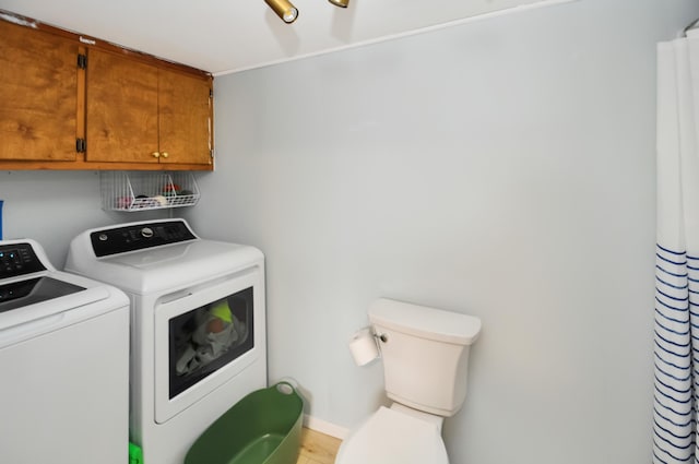 washroom featuring independent washer and dryer