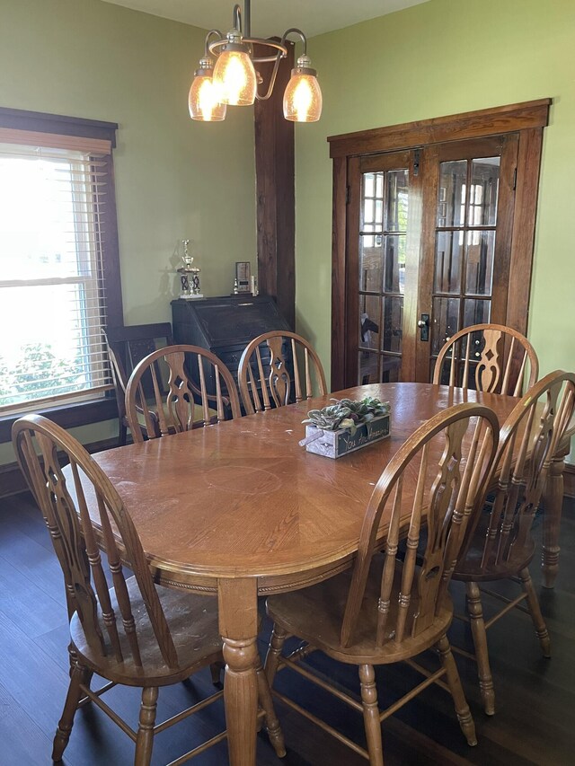 1211 N Lowry Ave, Springfield, OH 45504 - dining area with wood finished floors and a chandelier