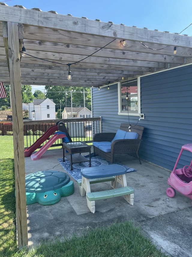 1211 N Lowry Ave, Springfield, OH 45504 - view of patio featuring a playground