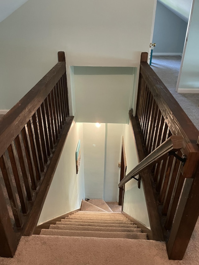 1211 N Lowry Ave, Springfield, OH 45504 - staircase with carpet and lofted ceiling