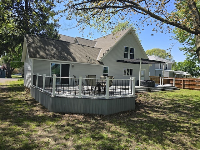 318 W Buckeye St, Belle Center, OH 43310 - rear view of house featuring roof with shingles and a deck