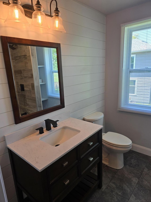 318 W Buckeye St, Belle Center, OH 43310 - bathroom featuring wooden walls and vanity