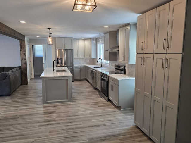 318 W Buckeye St, Belle Center, OH 43310 - kitchen featuring appliances with stainless steel finishes, gray cabinetry, a sink, wall chimney range hood, and recessed lighting