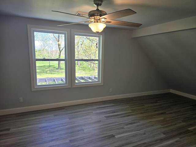 318 W Buckeye St, Belle Center, OH 43310 - additional living space featuring dark wood finished floors, a ceiling fan, and baseboards