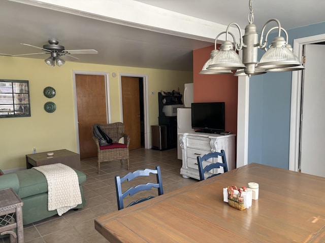 tiled dining area featuring a ceiling fan